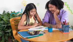 Mom and daughter work on homework