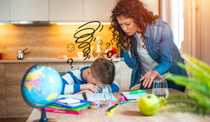 Parent and student work on homework. The student is frustrated.